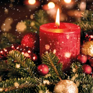 A pack of 10 The Leprosy Mission Christmas cards featuring a warm candle design and an inspirational Bible verse from Psalm 119:105.