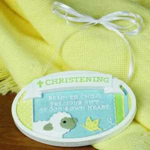 An oval resin Christening plaque featuring decorative text and a ribbon hanger, ideal as a thoughtful religious gift for a baptism or baby dedication.