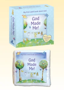 A soft, durable cloth book for babies titled God Made Me, displayed inside its gift box as part of our Children's Bibles and Story Books collection.