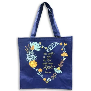 Eco-friendly tote bag from our collection of totes and pouches, featuring a recycled nylon construction with a decorative floral heart pattern.