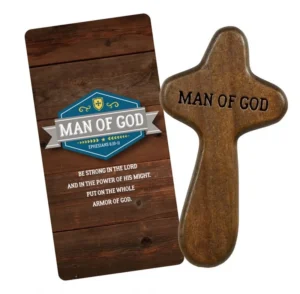 A wooden prayer cross engraved with the words Man of God held in a hand, presented as a meaningful Christian gift for spiritual devotion and comfort.