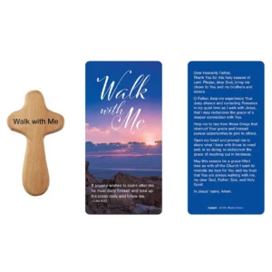 A smooth 4-inch wooden hand-held prayer cross from the Walk with Me Christian gifts collection, held in a palm to show scale and comfort.