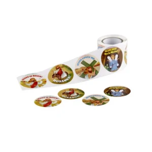 Roll of 'Jesus is Risen!' stickers, perfect for Easter gifts, featuring Christian resurrection themes.