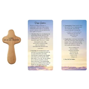 A smooth, hand-held wooden prayer cross etched with inspirational words, perfect for personal meditation and a thoughtful addition to our collection of other Christian gifts.