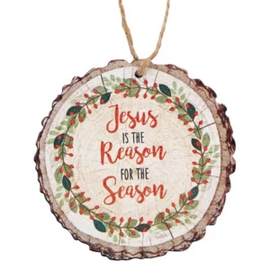 Rustic wood slice Christmas ornament featuring the decorative text Jesus is the Reason, perfect for farmhouse style holiday tree decor and Christian Christmas gifts.