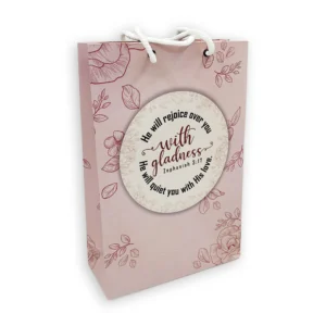 A medium-sized gift bag from our tote bags and pouches collection, elegantly decorated with the inspirational Bible verse Zephaniah 3:17 about rejoicing and gladness.