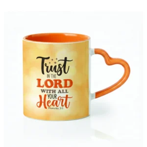 A white ceramic mug with a unique heart-shaped handle, prominently featuring the scripture 'Trust in the Lord with all your heart. Proverbs 3:5'. This inspirational and faith-based mug is ideal for daily encouragement and makes a thoughtful gift from our collection of scripture mugs.