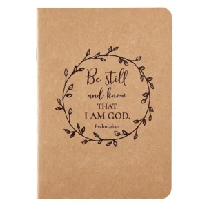 A lightweight notepad and jotter featuring a kraft paper hardcover with inspirational be still and know text and 20 sheets of lined paper.