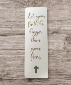 A meaningful paper bookmark featuring the inspirational quote Let your faith be bigger than your fears, part of the Rock Foundation charity collection of unique Pens and Bookmarks.