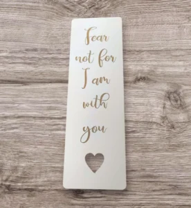 A decorative religious bookmark from the Pens and Bookmarks collection featuring the inspirational quote Fear not for I am with you printed on a durable card stock.