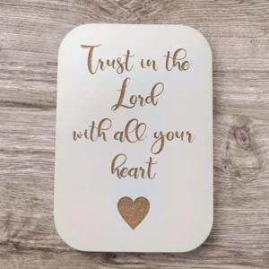 A decorative magnet featuring the inspirational quote Trust in the lord with all your heart, designed as a meaningful gift from the Rock Foundation charity magnet collection.