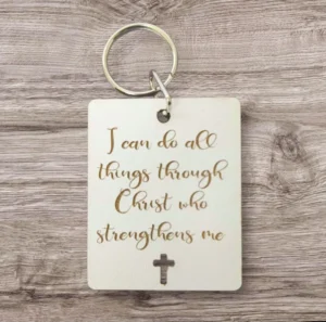 A metal keyring engraved with the inspirational verse I can do all things through Christ who strengthens me, perfect as a religious gift or motivational accessory in our keyring collection.
