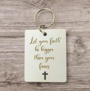 A high-quality metal keyring featuring the inspirational quote Let your faith be bigger than your fears, part of our meaningful religious gifts and keyring collection.