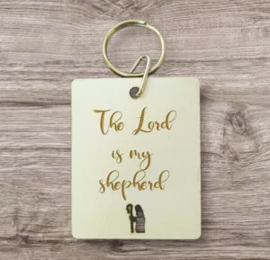 A high-quality metal keyring featuring the biblical inscription The Lord is my shepherd, presented as a meaningful religious accessory from our unique collection of faith-based keyrings.