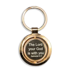 An elegant copper keyring featuring the engraved inspirational Bible verse from Zephaniah 3:17, serving as a faith-based religious accessory.