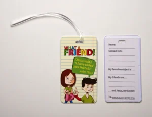 A sturdy plastic ID tag featuring a Bible verse, perfect as an affordable Christian gift for school backpacks, bookbags, or travel luggage.
