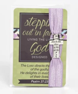 A delicate elastic bracelet featuring a small silver metal cross charm, presented on an inspirational display card, ideal as a thoughtful Mother's Day gift or religious accessory for women and children.
