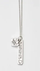 A delicate silver dual-pendant necklace for women featuring a Christian scripture engraving and a tea-shaped charm, perfect as a thoughtful Mother's Day gift from our faith-inspired jewellery collection.