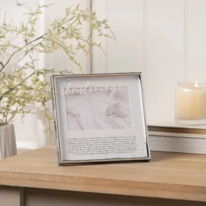 Close-up of an elegant silver-tone photo frame featuring the words 'With Love' and designed for a Christening. This beautiful photo frame is ideal for displaying a cherished 6x4 inch memory of the special day.