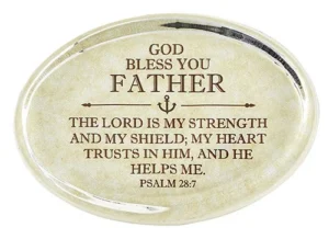 A rectangular glass tabletop paperweight featuring the Bible verse Psalm 28:7, designed as a religious gift for fathers with a protective felt backing.
